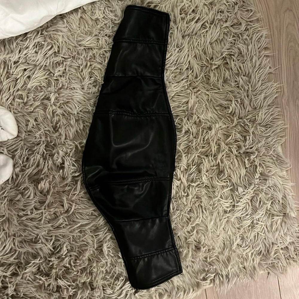 it’s a tube top with a zipper. only wore once for a birthday.
